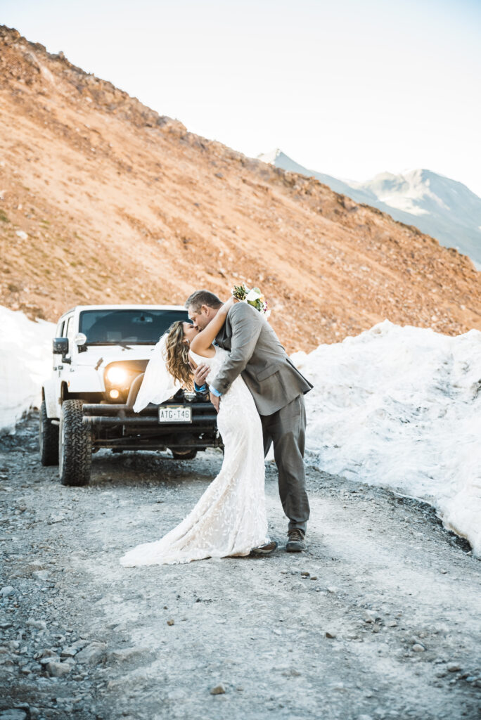Eloping couple on a Colorado jeep trail